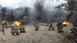 Ukrainian soldiers take part in a combat drills for psychological training