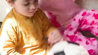 Cute kids playing video