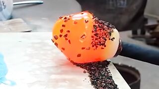 Talented guys make a beautiful ornament from glass