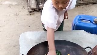 Little chef preparing lunch for grandma & grandpa