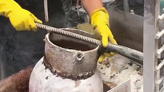 Polishing a beautiful red ornament