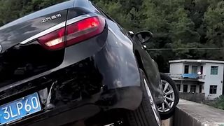 Two experienced drivers meet on a narrow rural road