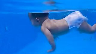 Brave babies getting swimming lessons