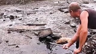 Dog rescued from black oil pit makes a miraculous recovery!