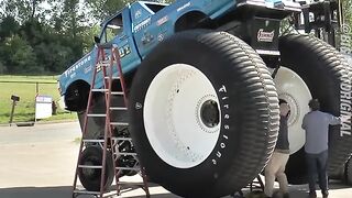 Here is what happens when you fit 10-foot military tires on a pickup truck