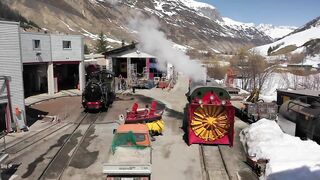 Snow plough in the swiss mountains