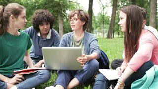 A group of students discussing a topic