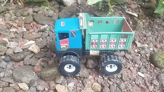 MOBIL TRUCK DUMP ANGKUT BATU NIE