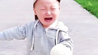 The child is afraid of the buffalo funny video