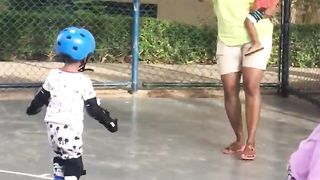 Younger boy learning skating skills