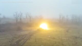 Ukrainian tank storms foggy battlefield and guns down Russian troops in trenches