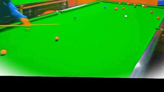 Playing Snooker