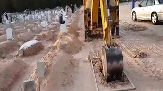 How is the process of digging graves