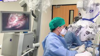 A doctor performing an operation