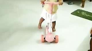 First Ride: Infant Learns to Ride a Bike