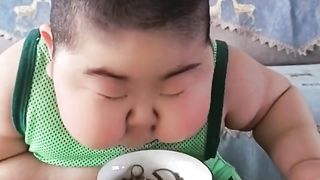 Cute baby eating 2