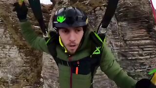 Join Cristian in his BASEjumping gear and he flies above the forest!