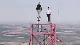 Climbing a 350m tower with no harness... don't make any wrong moves
