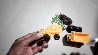 play with construction cars, mixer trucks and damtruks