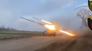 Ukrainian Battalion fires rockets from back of modified truck at Russian forces