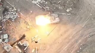 Ukrainian drones drop explosives into Russian IFV's open hatch and blow it up