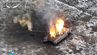 Ukrainian Kamikaze drone crashes into Russian tank blowing it to pieces