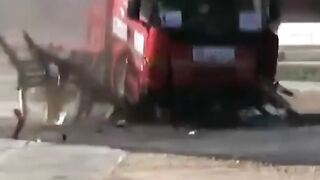 An extravagant way to stop a truck...completely destroy it