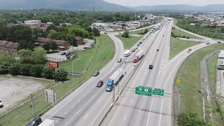 A speedy car accident on a busy road