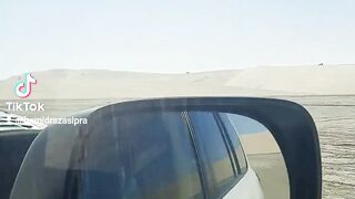 Luxury car in desert
