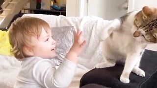 Do you think the cat is playing with the baby?