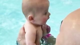 Cute baby in swimming pool