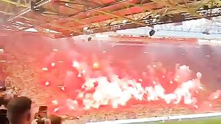look at the actions carried out by ultras fans in the stadium like a fire
