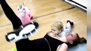 Exercise mom feeding child