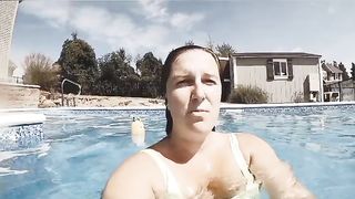 Beautiful Russian girl in swimming pool