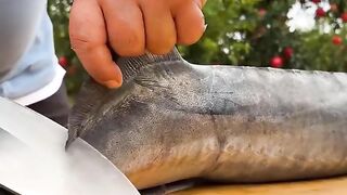 Chef cooking with fish