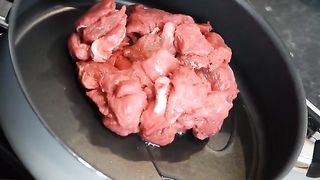 Beef cooking with milk and oil etc.