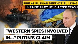 Fire at Russian Defence Building, Ukraine Pilot Held After Crash, Putin Blames US-Led Coup for War