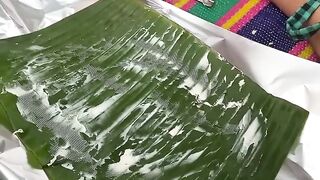 Pan fried pizza on banana leaf