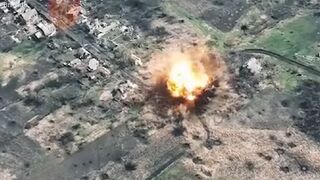 Ukrainian forces leave hole in the ground from striking Russian troops near Bakhmut