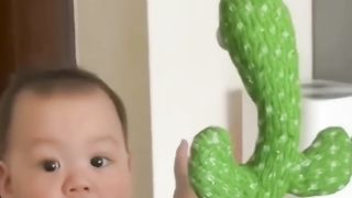 BABY WITH CACTUS TOY