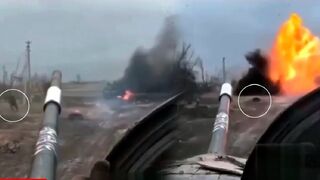 Russians watch how their leading tank hits a mine and burns