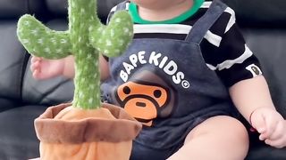 BABY AND THE CACTUS