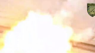 Ukrainian 128th TD Brigade drops munition on a Russian ammunition stockpile causing an instant explosion