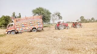 Truck vs Tarecter & harvest machine