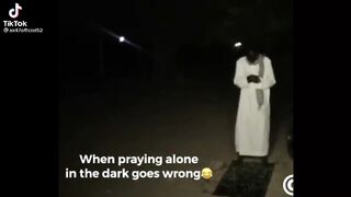 Praying alone in dark