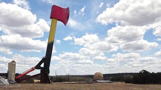 World's largest Axe VS GIANT RUBBER BAND Ball
