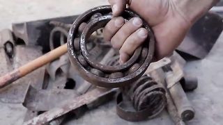 Turning a Rusty Bearing into a Beautiful but Extremely Sharp BUTTERFLY KNIFE