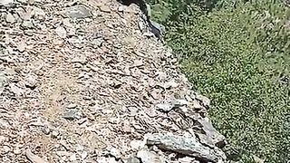 Motorcycle_ mounrtain_ narrow path.