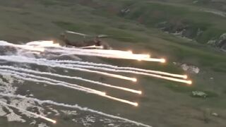 Russian attack helicopters spray missiles targeting Ukrainian position