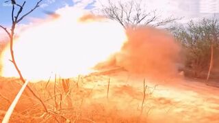 Ukrainian servicemen fire howitzers at Russian positions near Bakhmut